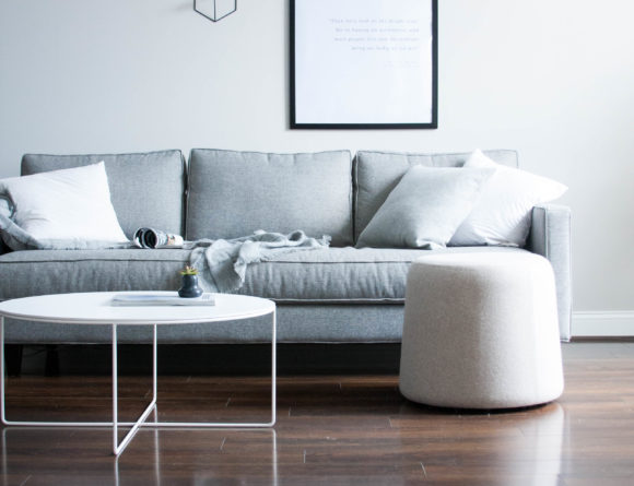 minimalist living room grey sofa print white home