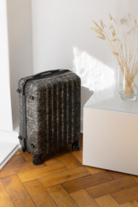 PROJECTKIN Travle Suitcase - Sustainable Luggage and travel accessories from eco friendly materials | Danish design, Scandinavian products, mindful accessories, luggage | product photography, shadows, light, minimalist aesthetic | RG Daily Blog