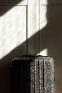 PROJECTKIN Travle Suitcase - Sustainable Luggage and travel accessories from eco friendly materials | Danish design, Scandinavian products, mindful accessories, luggage | product photography, shadows, light, minimalist aesthetic | RG Daily Blog